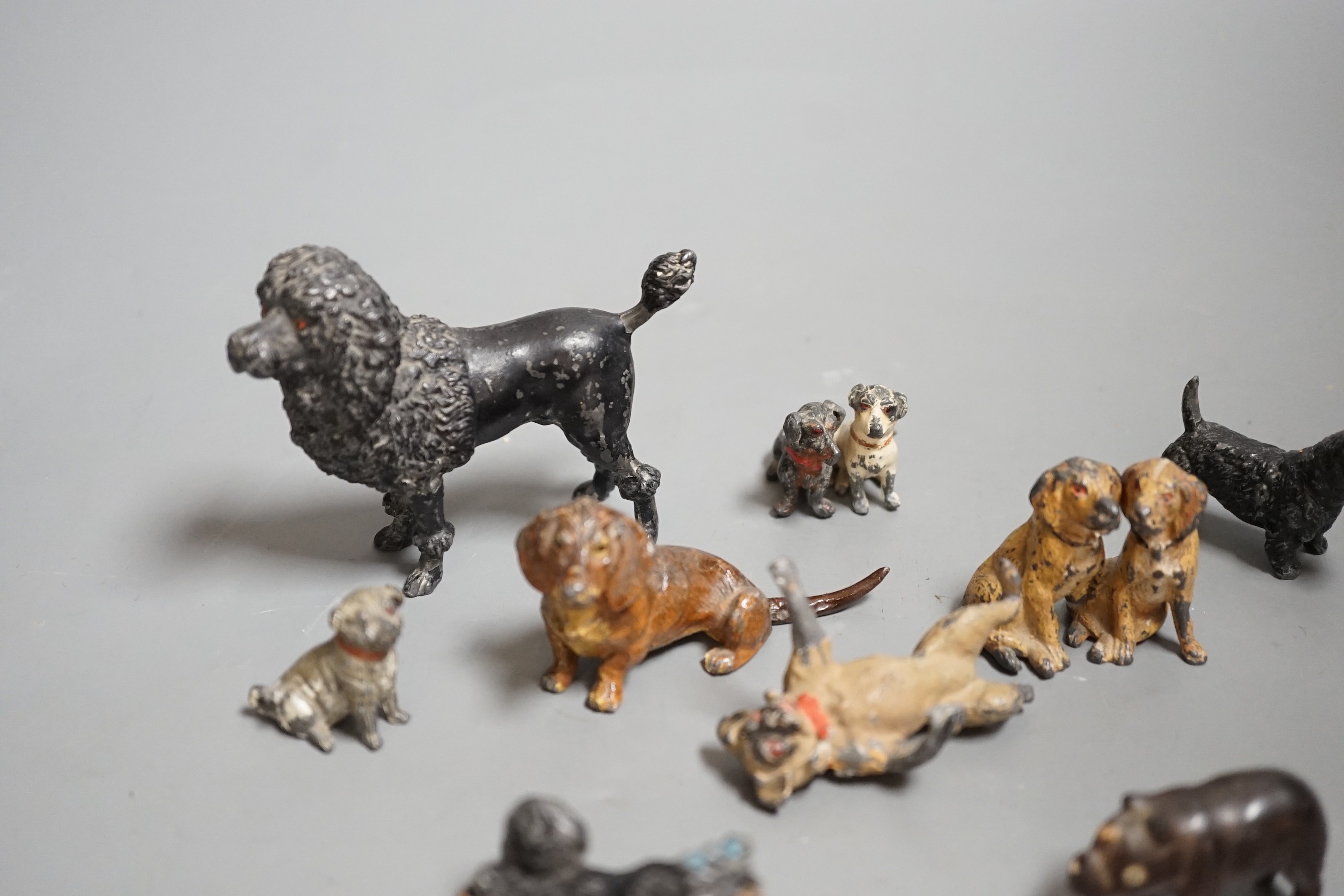 A small collection painted cast metal figures, dogs, to include ‘dancing dogs’, (group)